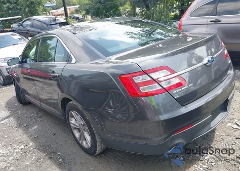 2015 Ford Taurus Sel z USA, uszkodzony, nr VIN 1FAHP2H82FG177210